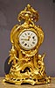 An important Louis XV gilt bronze mantle clock of fourteen day duration by Jean-Baptiste III Albert Baillon
